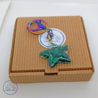 Gwiezdny brelok z zieloną muszlą