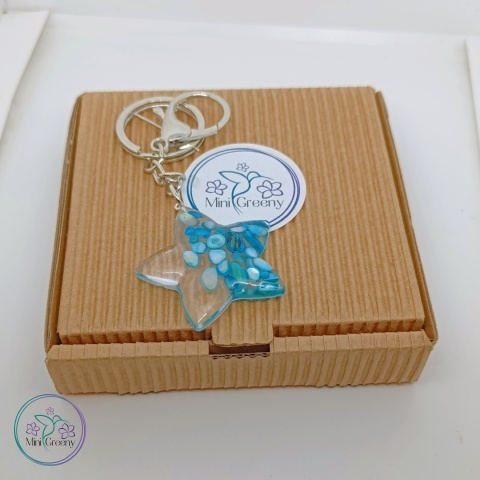 Gwiezdny brelok z błękitną muszlą