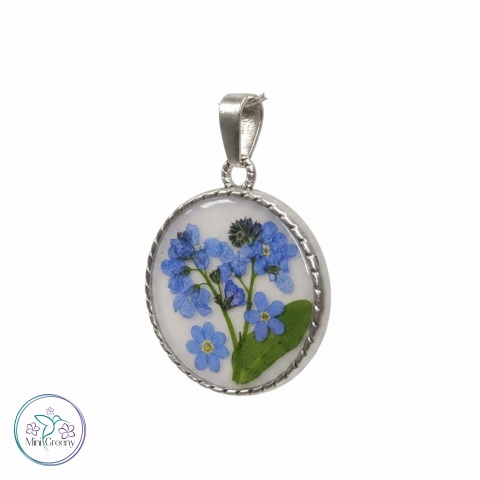 Okrągły wisiorek z niezapominajką