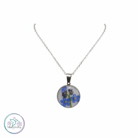 Mały okrągły wisiorek z niezapominajką