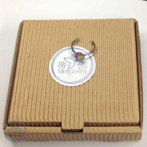 Regulowany pierścionek z kolorowymi kwiatuszkami